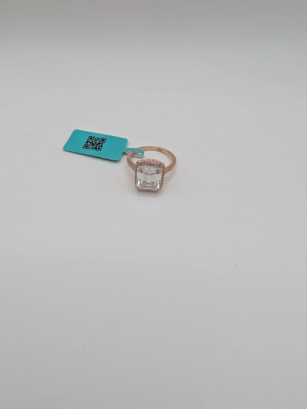 Rose Gold Halo Emerald-Cut Cubic Zirconia Engagement Ring